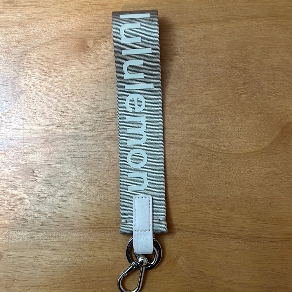 Lululemon Never Lost Keychain Raw Linen/White Opal